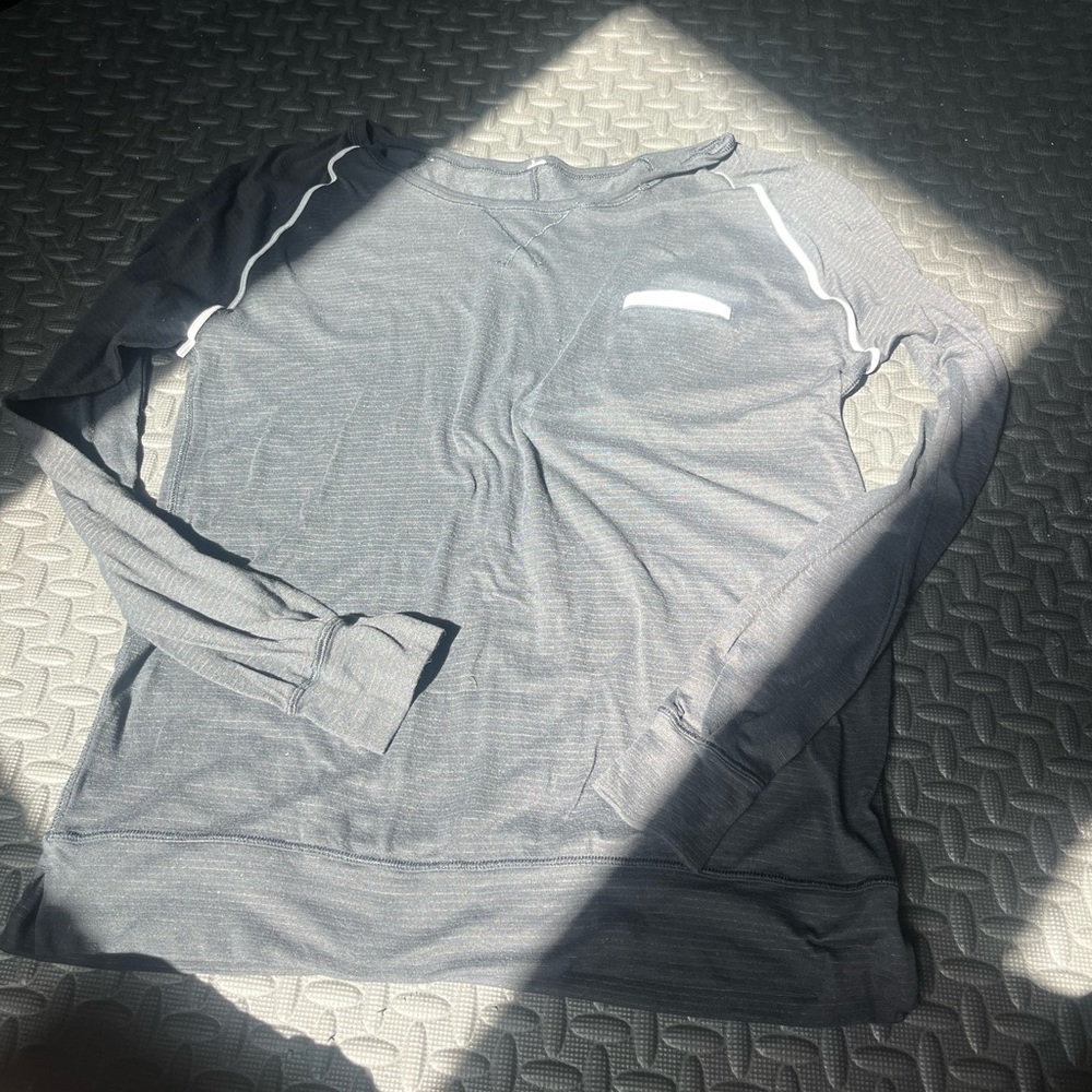 Lululemon black and white striped long sleeve with reflective pocket size 2